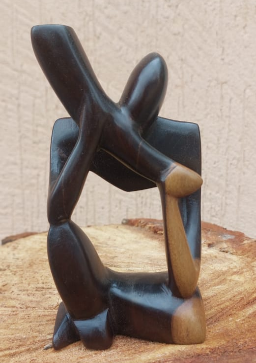 Vintage Hand Carved African Man Playing Horn